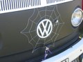 Spiders Web detail in front of bay window bus